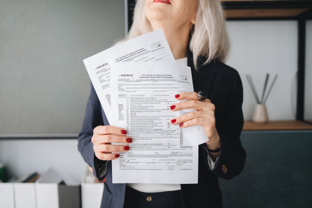 A Person Holding Papers